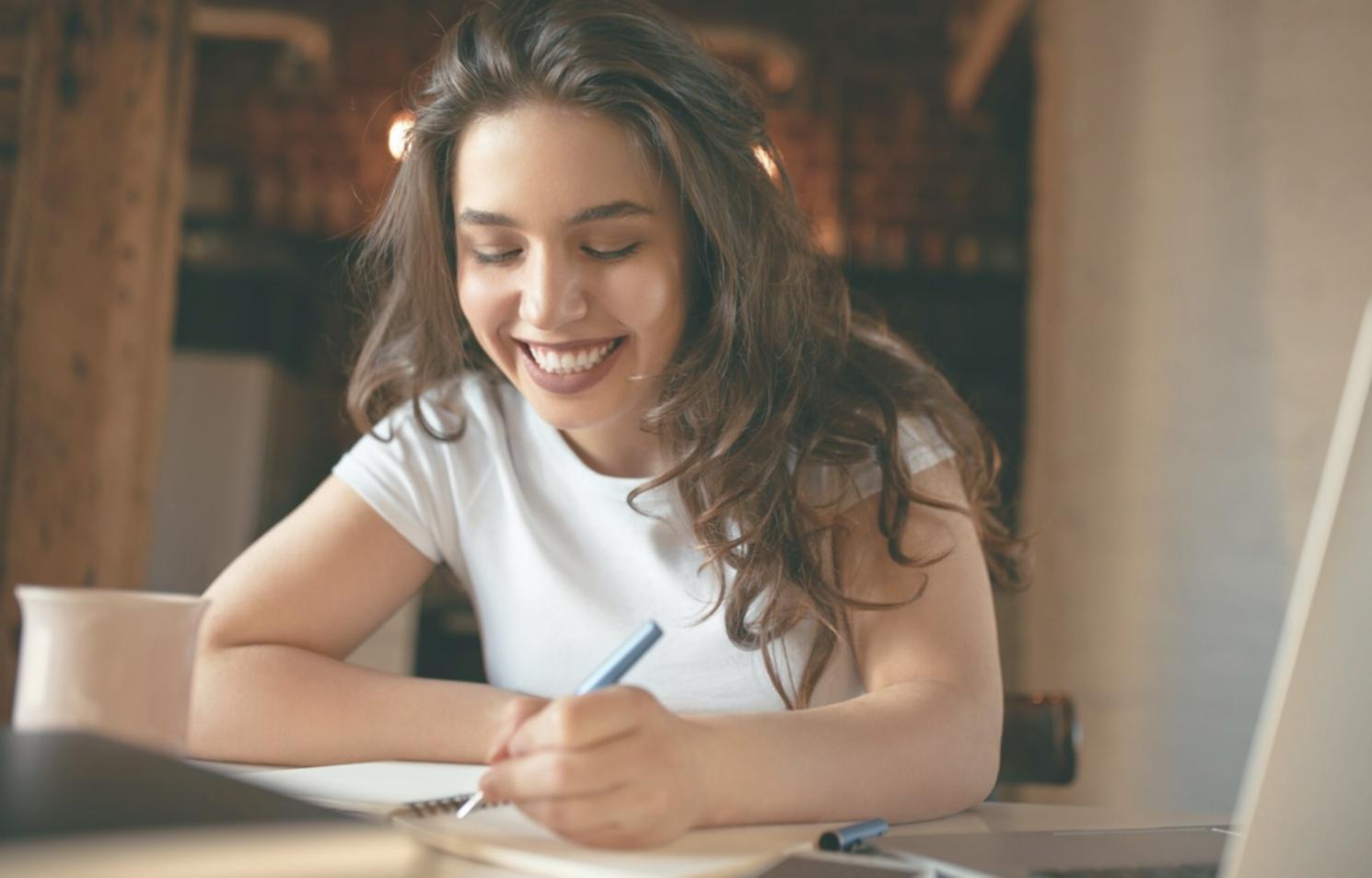 Professional business meeting discussing financial negotiation strategies with documents and charts on conference table