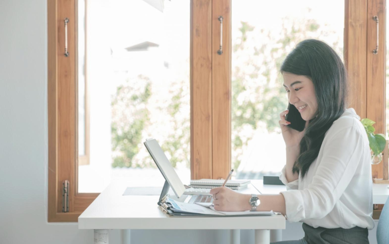 Financial documents and calculator showing negotiation preparation